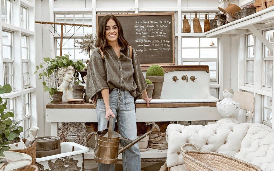 Woodland Pulse, an online retailer of modernist vase designs, unique flower pots, and unique plant pots, reposting a photo of Liz Marie Galvan holding a watering can.