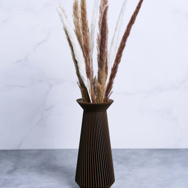 BANDA modernist brown vase with pampas grass.