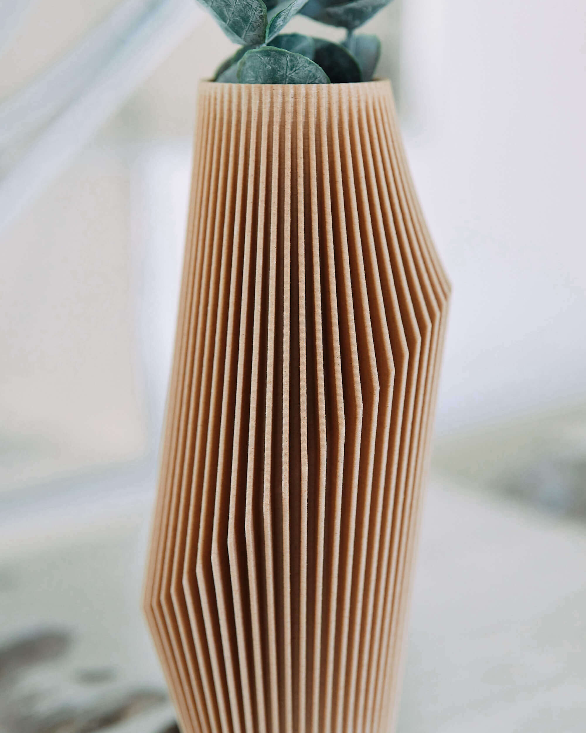 A cream color vase, unique vase.