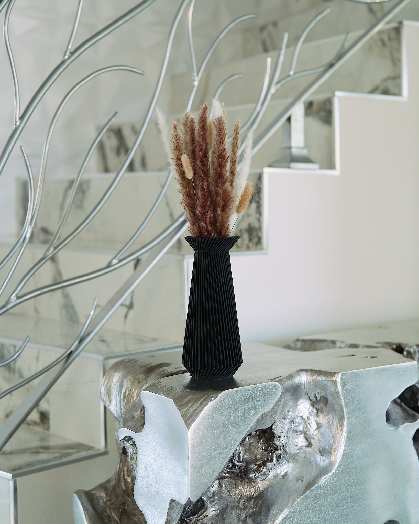 A black vase modern design by Woodland Pulse. This is one of Woodland Pulse's most sought after black vases.