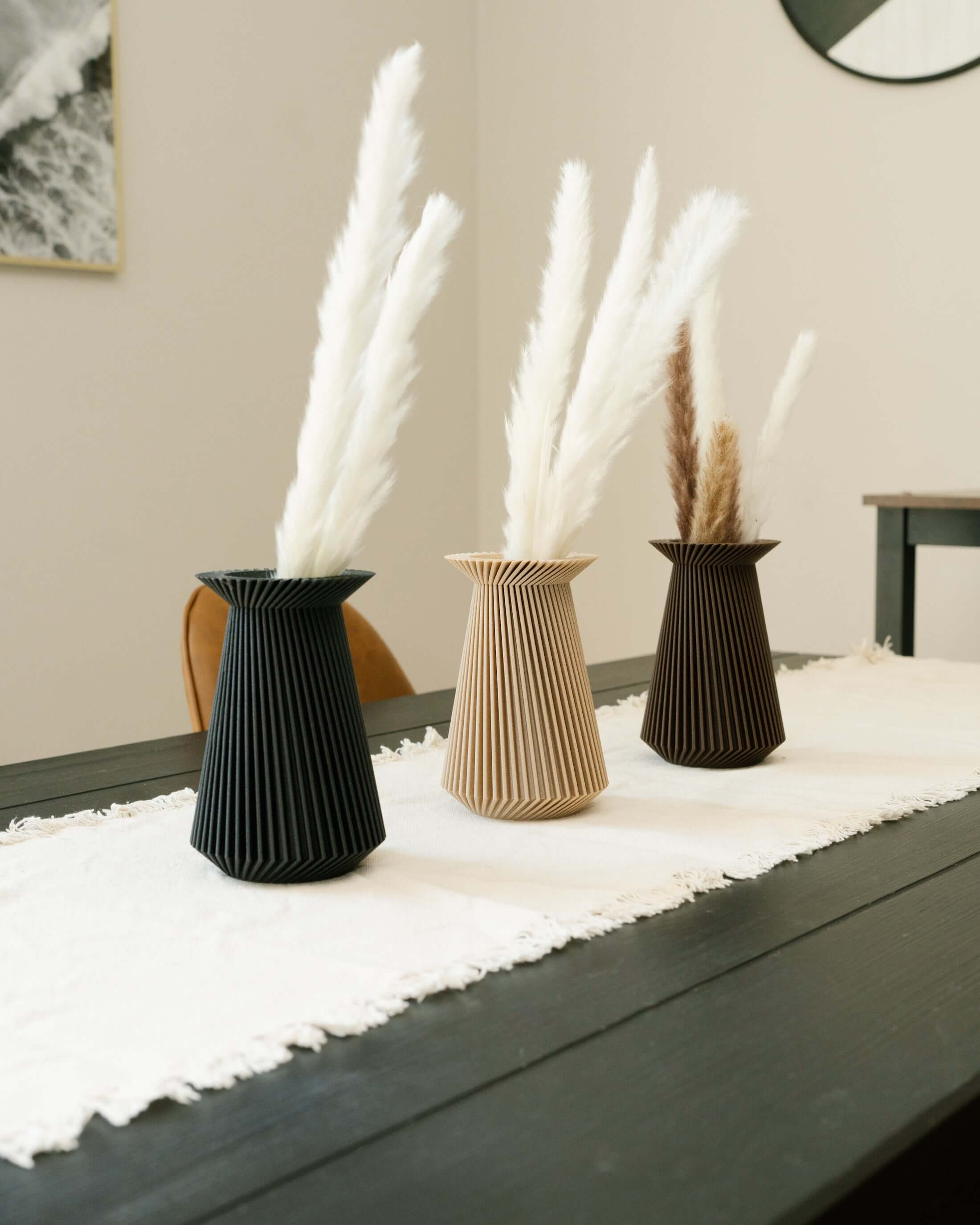 Set of three small vases with pampas grass.