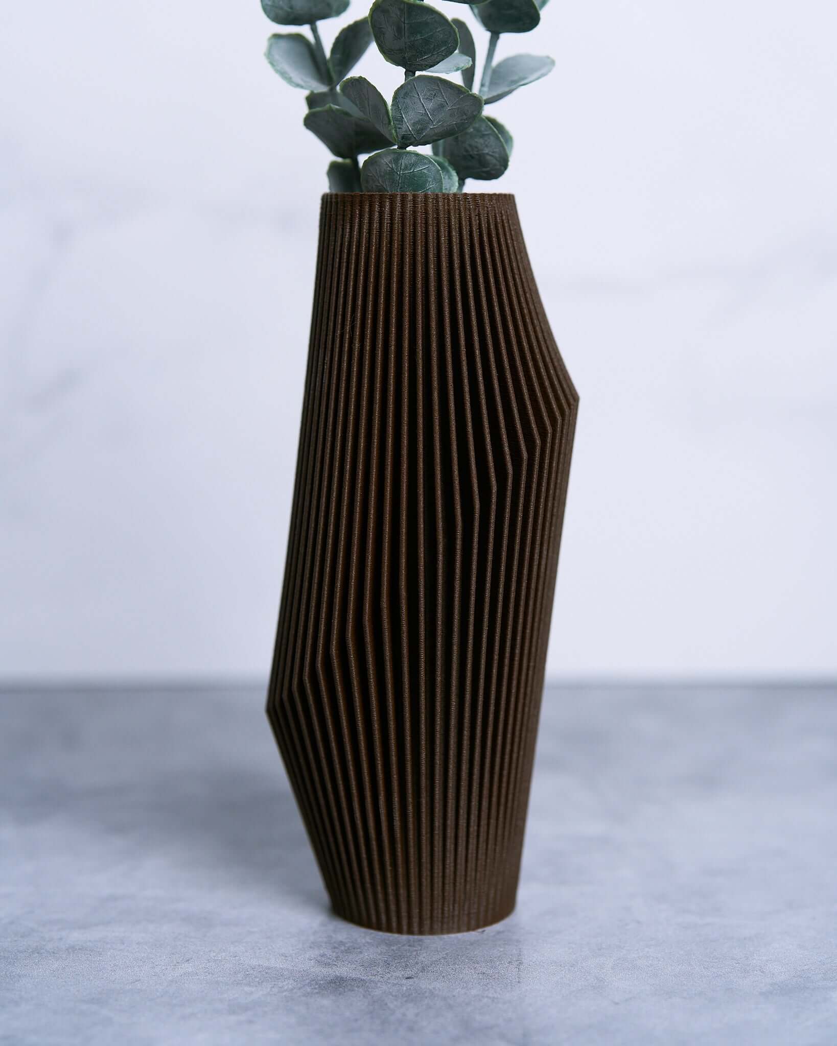 Abstract vase with eucalyptus.