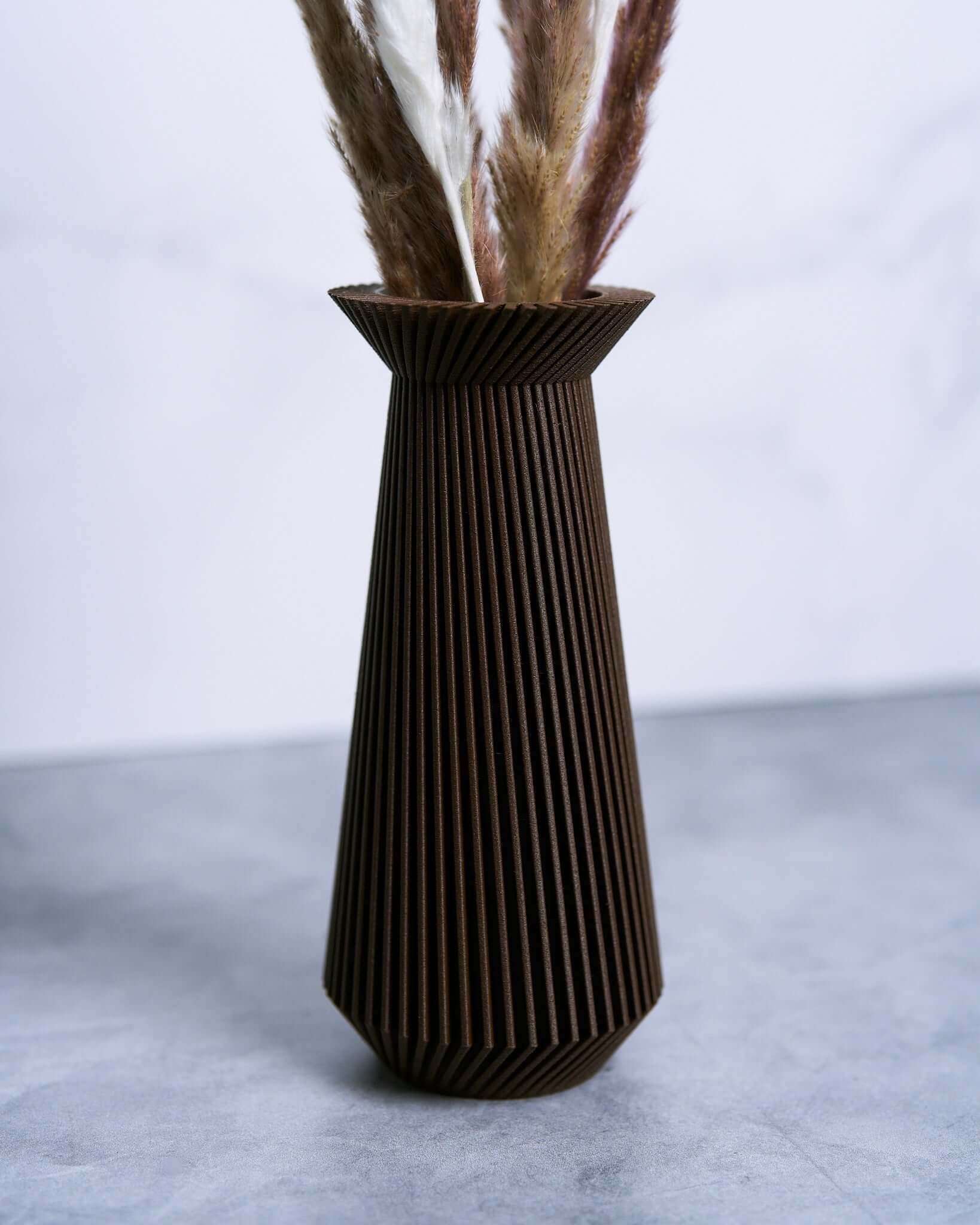BANDA brown modernist vase with pampas grass.