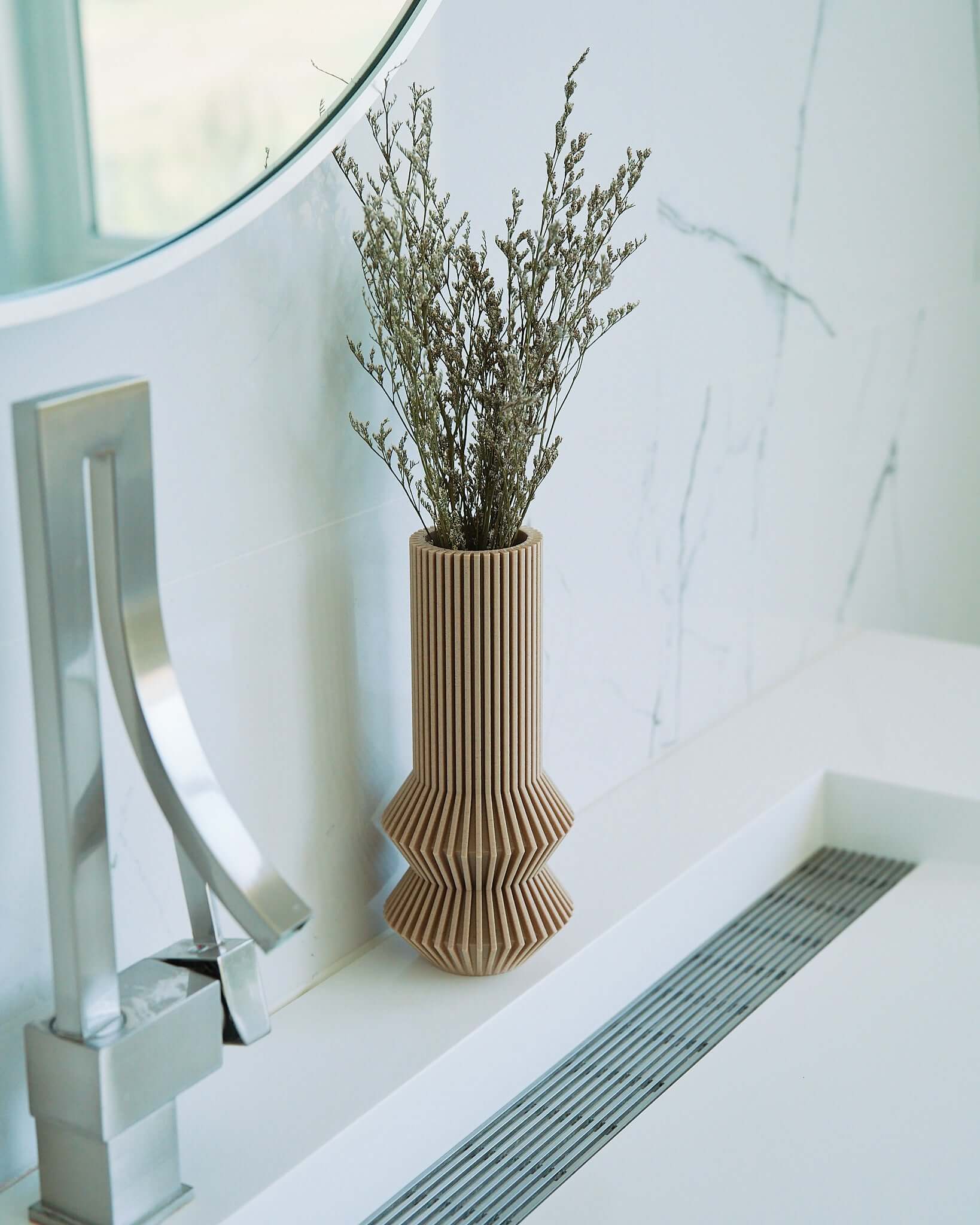 A small vase from Woodland Pulse. This is a cream color vase from the Woodland Pulse boho vases collection.