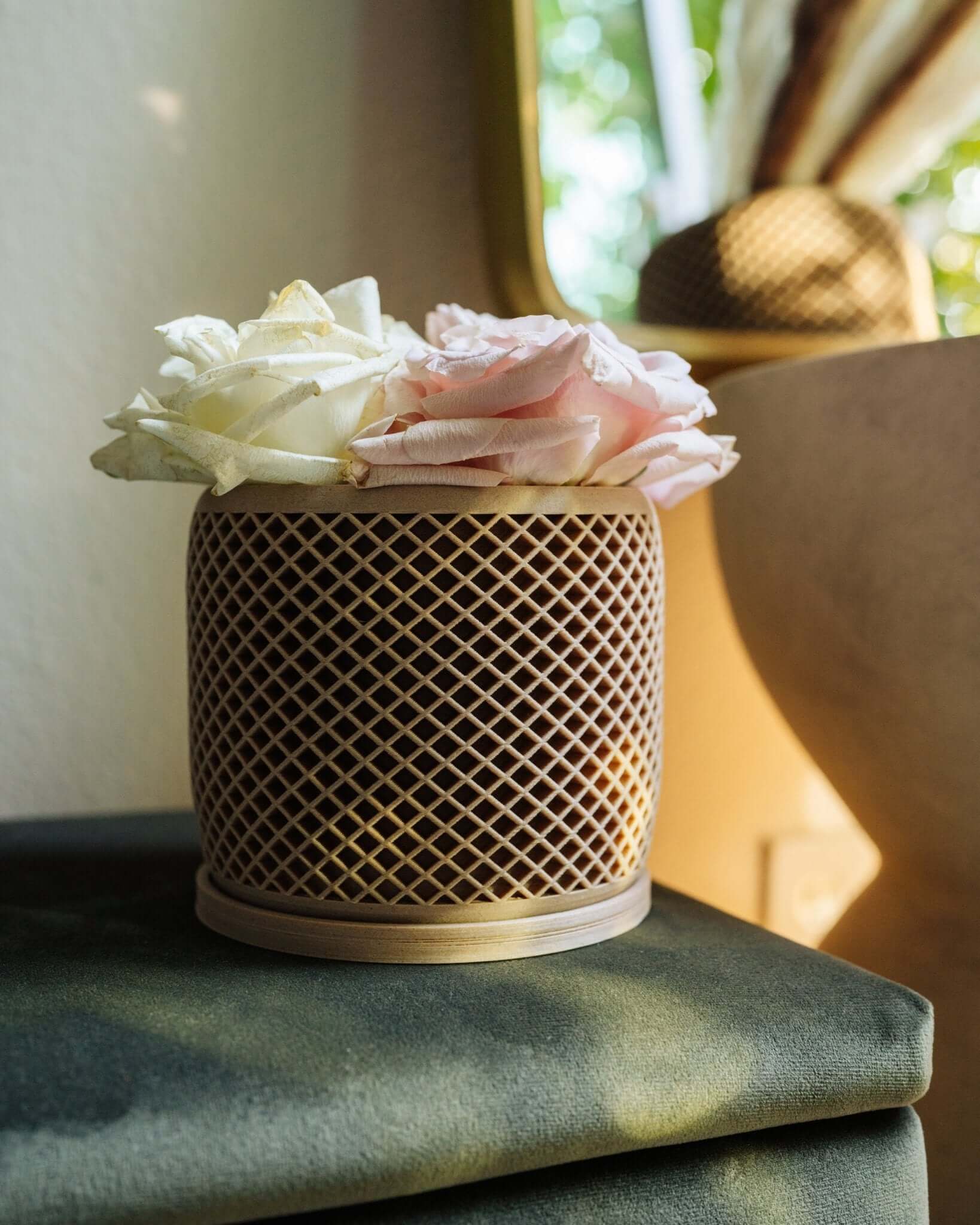 VISION™ geometric pot with white roses.